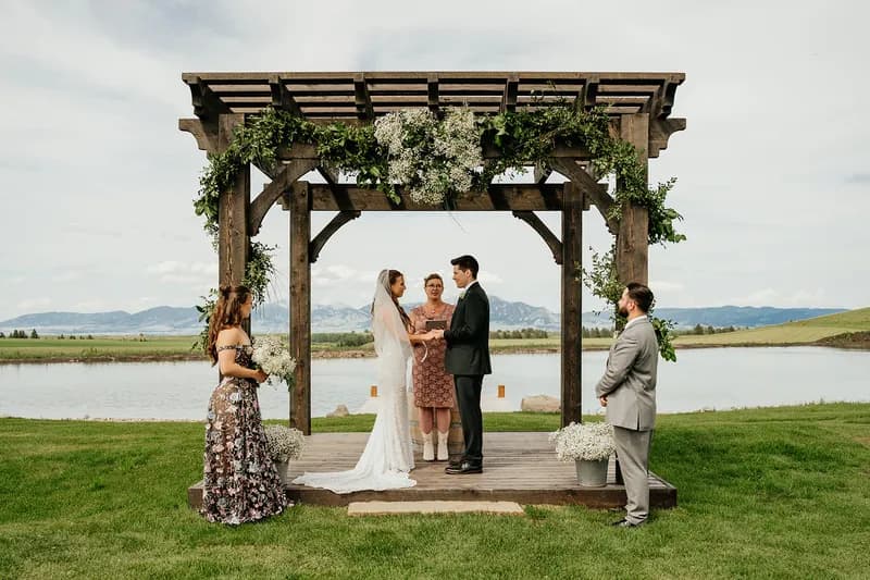 Evening lighting illuminating the timber frame venue exterior